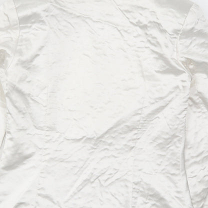 Brand and care label for In the Style women’s white jacket, size UK 6
