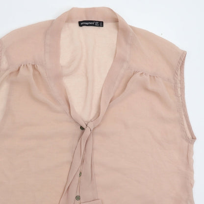 Close-up detail of Atmosphere women’s beige basic button-up, size UK 12