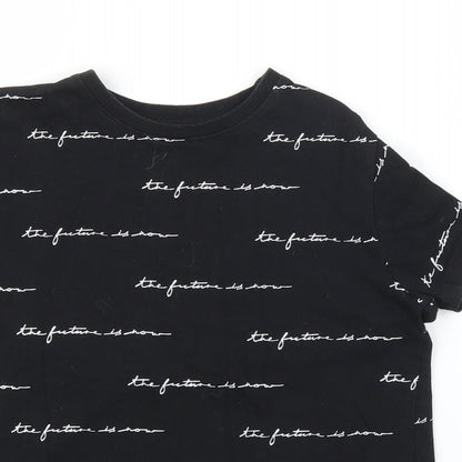 Close-up detail of Primark girls’ black basic t-shirt, size 9, years