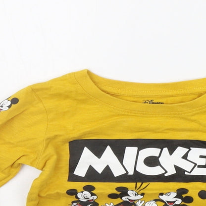 Close-up detail of Primark girls’ yellow geometric basic t-shirt, size 12-18, months - mickey mouse