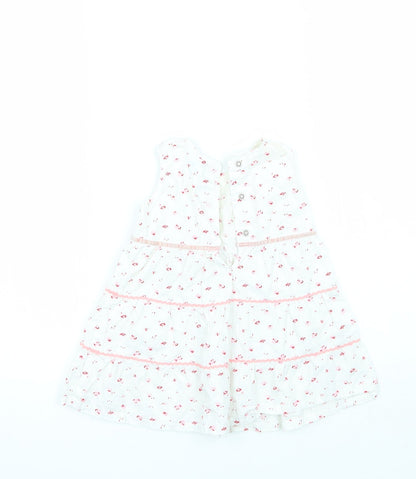 Back view of Adams girls’ white floral a-line, size 3-6, months