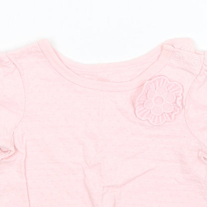 Close-up detail of Nutmeg girls’ pink basic t-shirt, size 0-3, months