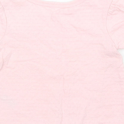 Brand and care label for Nutmeg girls’ pink basic t-shirt, size 0-3, months