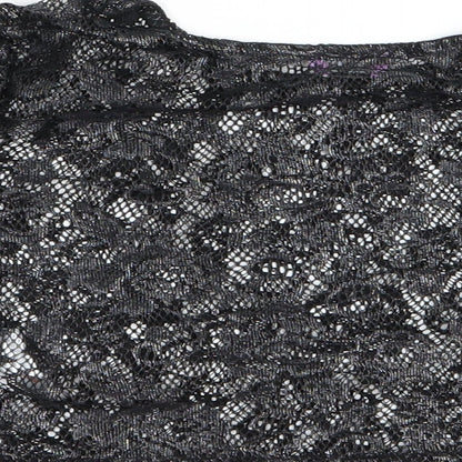 Brand and care label for F&F girls’ black floral basic t-shirt, size 8-9, years