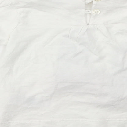Brand and care label for Marks & Spencer girls’ white basic t-shirt, size 12-18, months