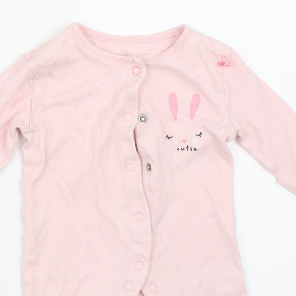 Close-up detail of Early Days girls’ pink babygrow one-piece size newborn