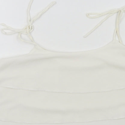 Brand and care label for Miss Selfridge women’s white colourblock basic blouse, size UK 10