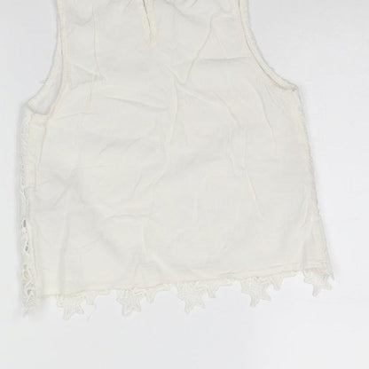 Brand and care label for H&M girls’ white basic tank, size 9, years