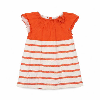 Front view of Gap girls’ orange striped a-line, size 3-6, months