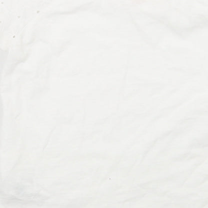 Brand and care label for F&F girls’ white basic t-shirt, size 6, years