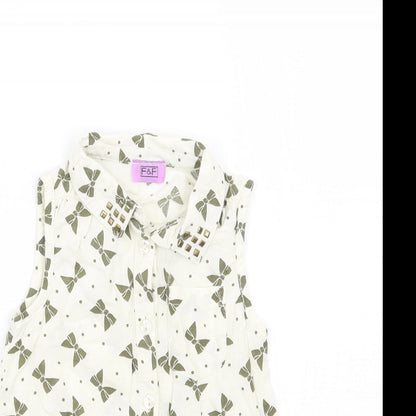 Close-up detail of F&F girls’ ivory geometric basic button-up, size 12-18, months