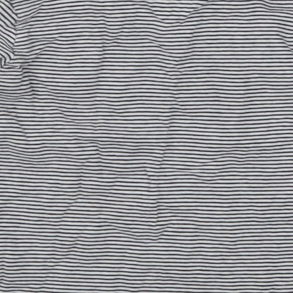 Brand and care label for F&F boys’ blue striped basic t-shirt, size 12-18, months