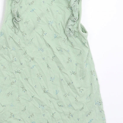 Brand and care label for Next girls’ green floral basic tank, size 5-6, years