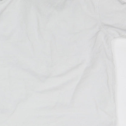 Brand and care label for Marks & Spencer girls’ white basic polo, size 7-8, years