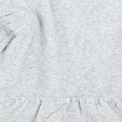 Brand and care label for Lupilu girls’ grey jumper, size 12-18, months