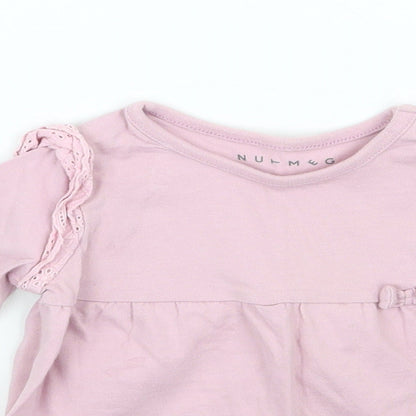 Close-up detail of Nutmeg girls’ purple basic t-shirt, size 12, months