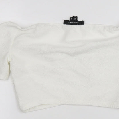 Brand and care label for Atmosphere women’s white basic t-shirt, size UK 12