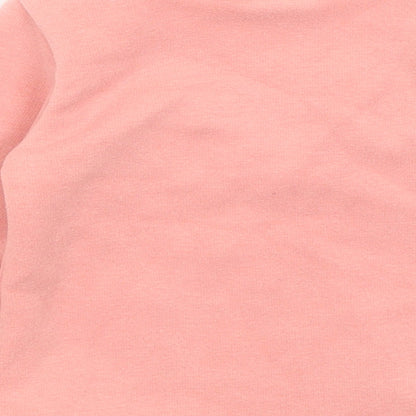 Brand and care label for Kacakid Baby Pink jumper, size 9-12, Months