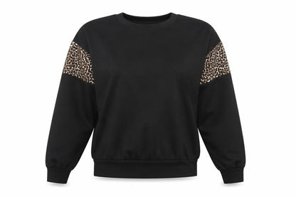 Front view of I SAW IT FIRST women’s black animal print pullover sweatshirt, size UK 10