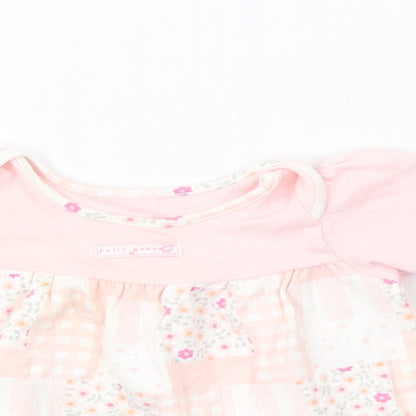 Close-up detail of Marks & Spencer girls’ pink check a-line, size 3-6, months