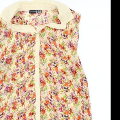 Close-up detail of Atmosphere women’s orange floral basic button-up, size UK 14