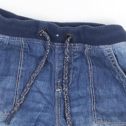 Close-up detail of Tu boys’ blue denim cropped jeans, size 12-18, months