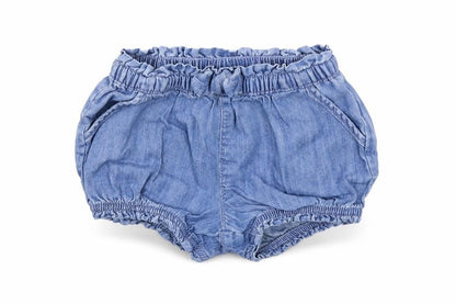 Front view of Gap girls’ blue cropped trousers, size 9-12, months - elasticated waist