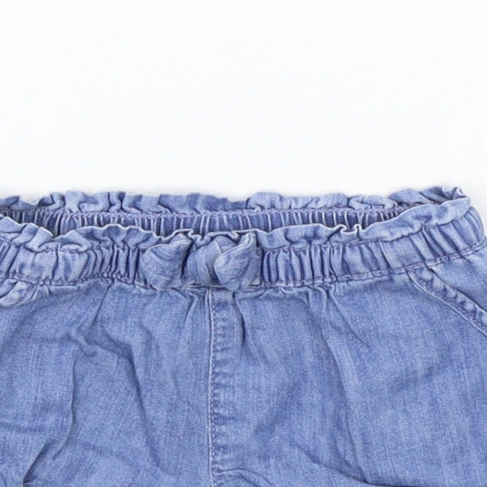 Close-up detail of Gap girls’ blue cropped trousers, size 9-12, months - elasticated waist
