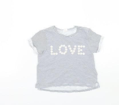 Front view of girls’ white striped basic t-shirt, size 6-9, months