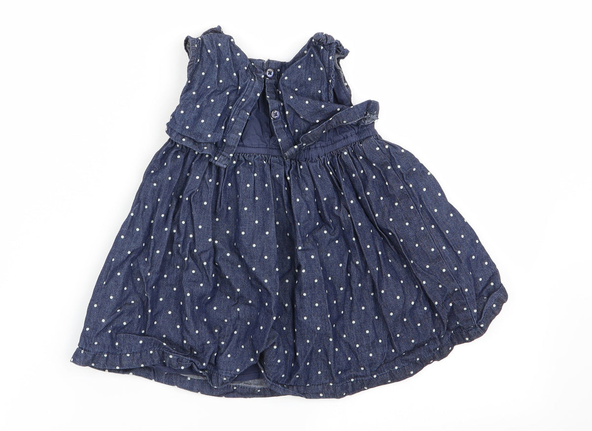 Back view of baby club girls’ blue polka dot fit & flare, size 9-12, months
