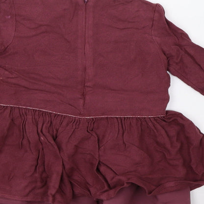 Brand and care label for F&F girls’ purple a-line, size 18-24, months