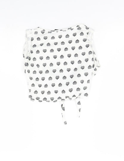 Back view of New Look girls’ white spotted basic tank, size 9, years