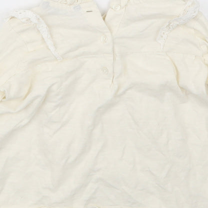 Brand and care label for George girls’ ivory basic t-shirt, size 2-3, years