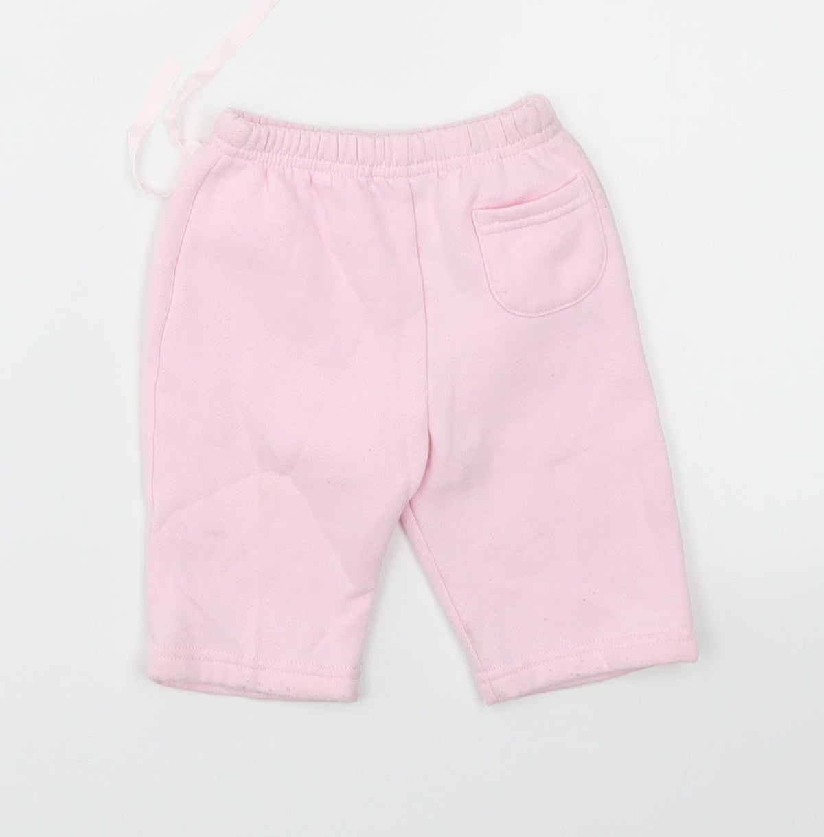 Back view of Early Days girls’ pink capri leggings, size 0-3, months