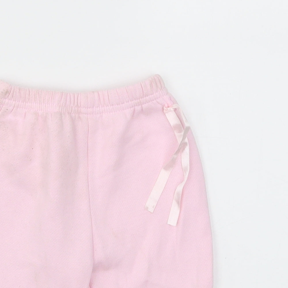 Close-up detail of Early Days girls’ pink capri leggings, size 0-3, months