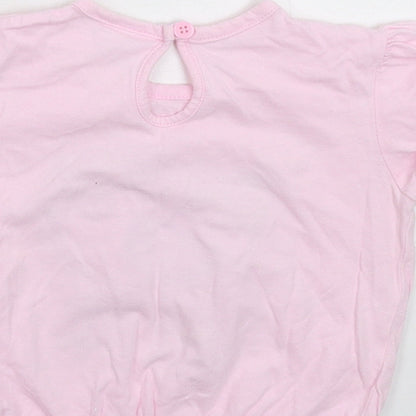 Brand and care label for F&F girls’ pink basic t-shirt, size 12-18, months