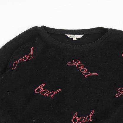 Close-up detail of French Connection women’s black pullover sweatshirt, size L, - good bad