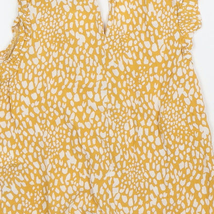 Brand and care label for Primark girls’ yellow basic blouse, size 3, years