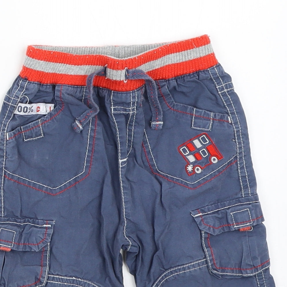 Close-up detail of Tu boys’ blue cargo trousers, size 6-9, months