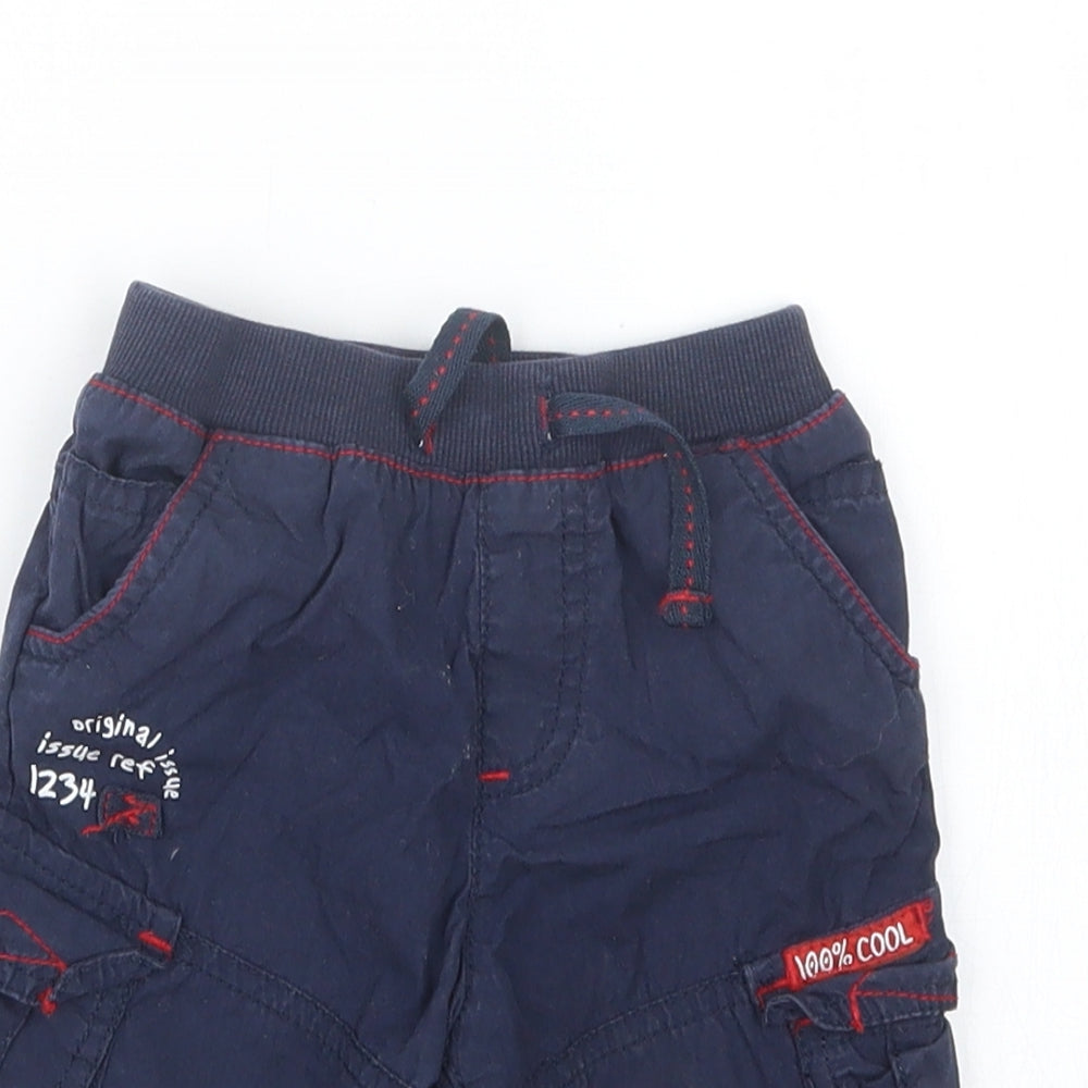 Close-up detail of Tu boys’ blue cropped trousers, size 3-6, months