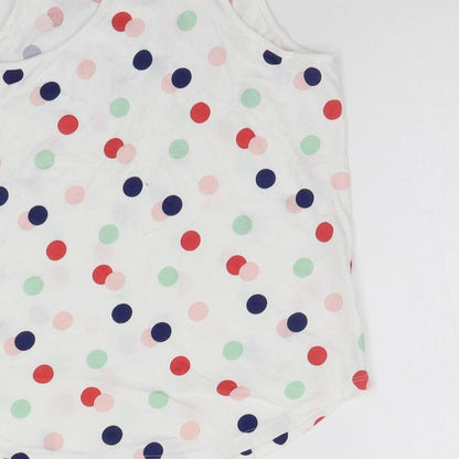 Brand and care label for H&M girls’ white polka dot basic tank, size 11-12, years