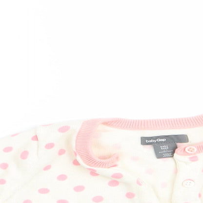 Close-up detail of Gap girls’ pink polka dot cardigan jumper, size 3-6, months