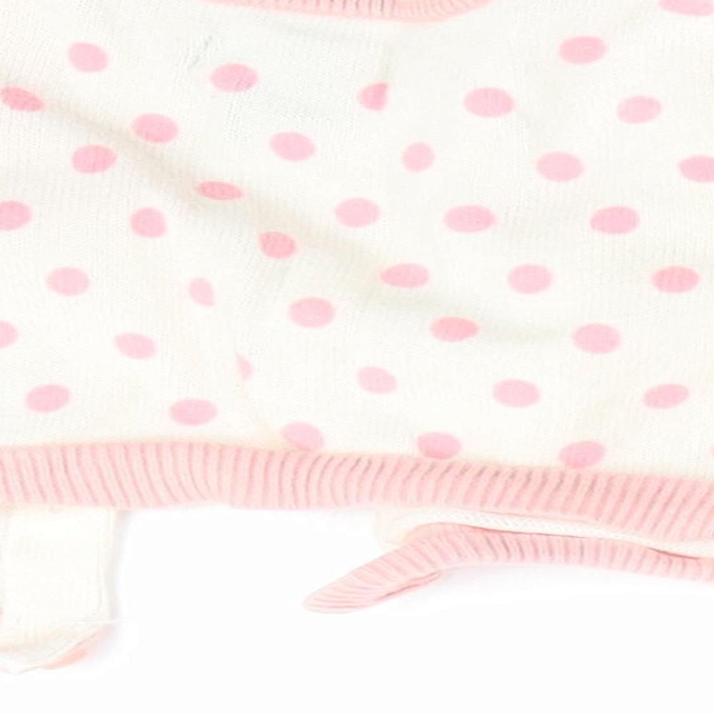 Brand and care label for Gap girls’ pink polka dot cardigan jumper, size 3-6, months