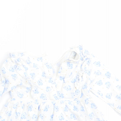 Close-up detail of Matalan girls’ blue floral a-line, size 3-6, months