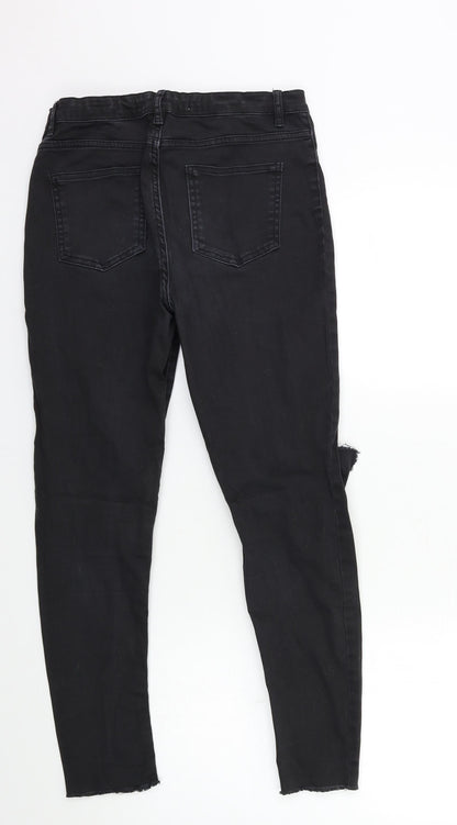 Back view of Denim & Co. girls’ blue denim skinny jeans, size 12-13, years