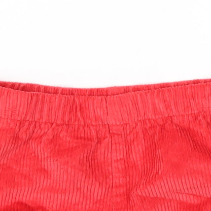 Close-up detail of Marks & Spencer girls’ red capri trousers, size 18-24, months