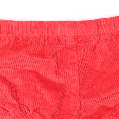 Brand and care label for Marks & Spencer girls’ red capri trousers, size 18-24, months