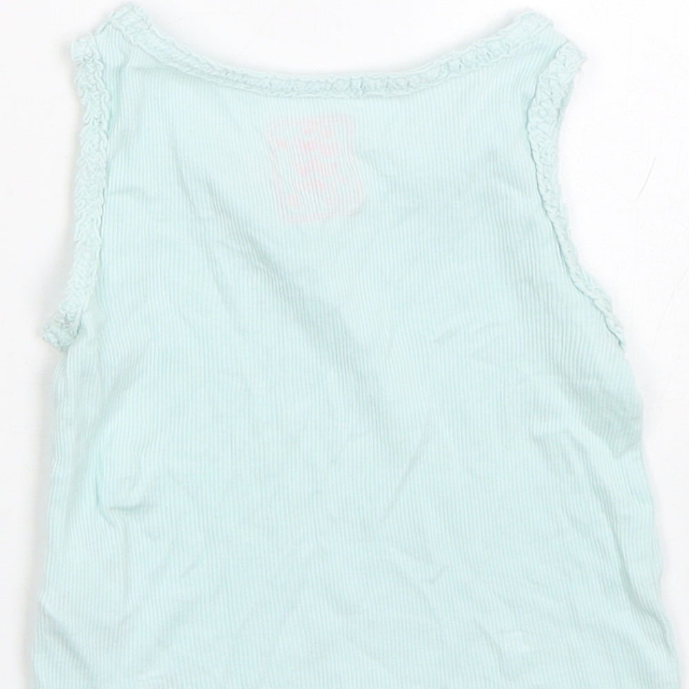 Brand and care label for F&F girls’ blue capri pyjama top, size 18-24, months