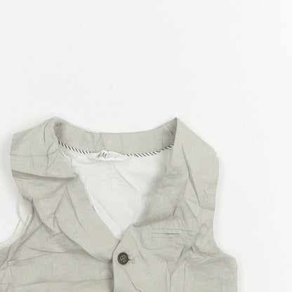 Close-up detail of H&M boys’ beige jacket waistcoat, size 2-3, years