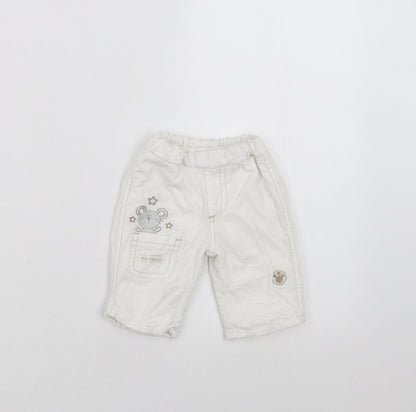 Additional front view of BHS girls’ white trousers size newborn - embroidered detail
